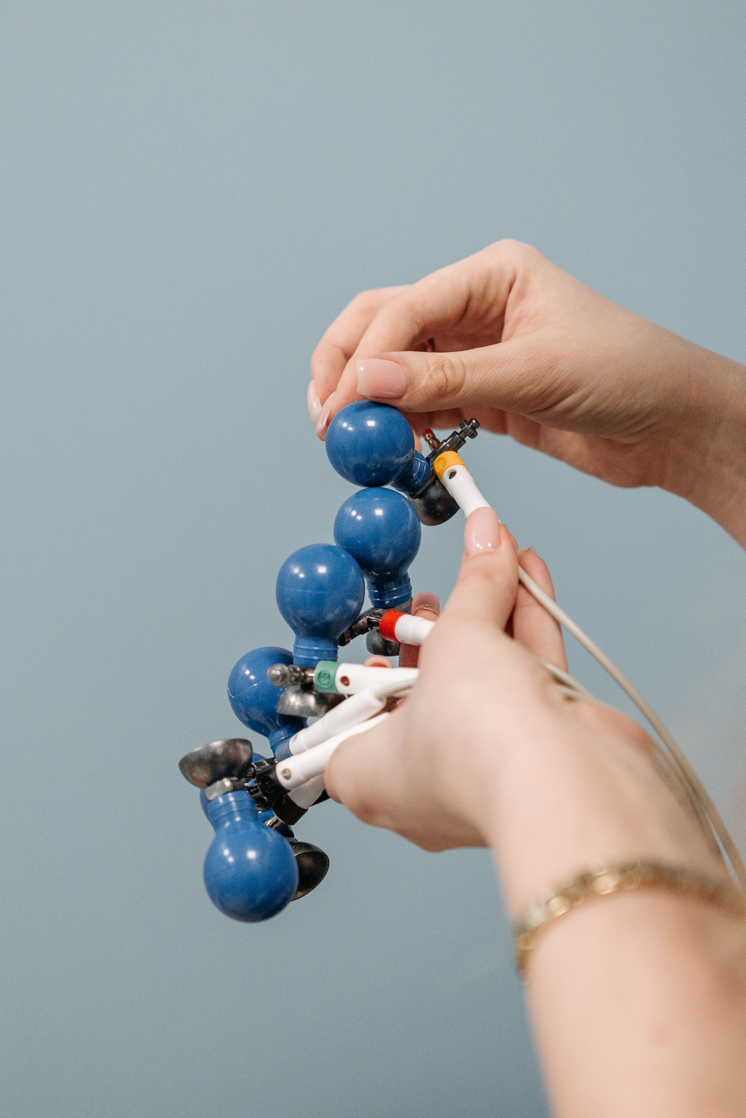 Hands testing and adjusting a practical model
